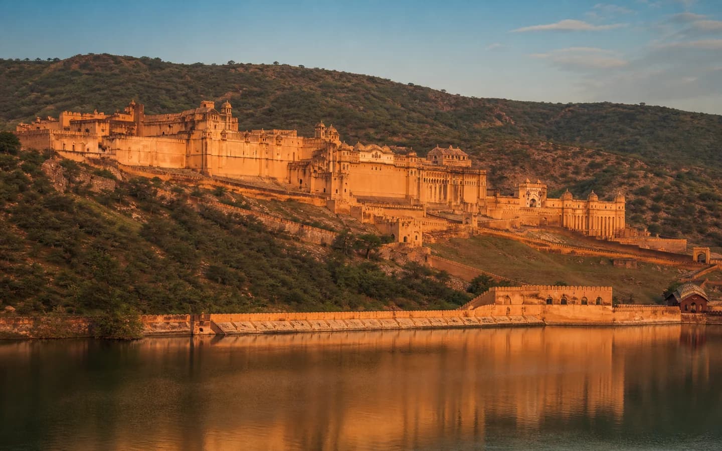 Amber Fort glowing above Maota Lake near Jaipur